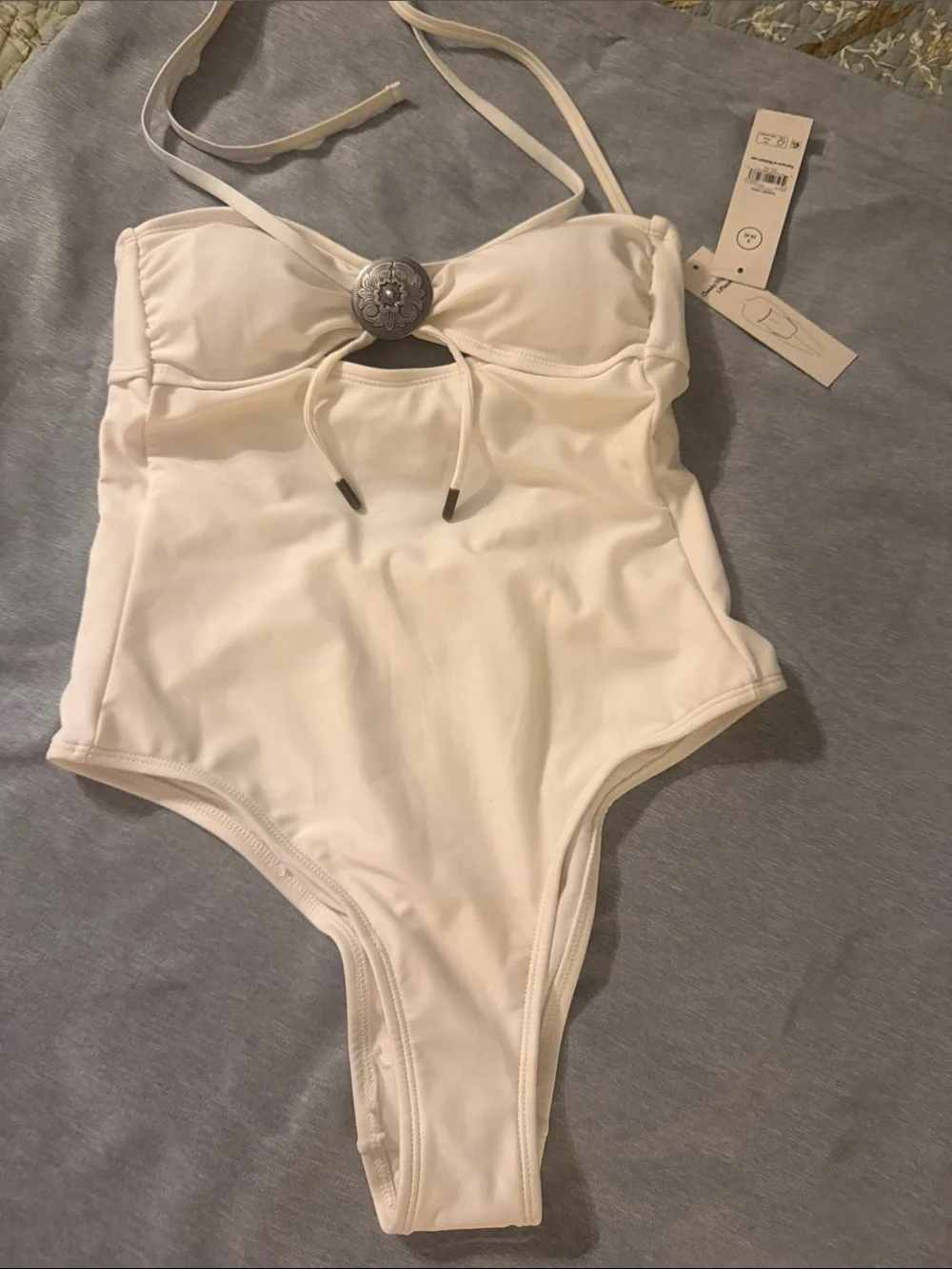 No Boundaries Cream One-Piece Swimsuit with Decorative Medallion
